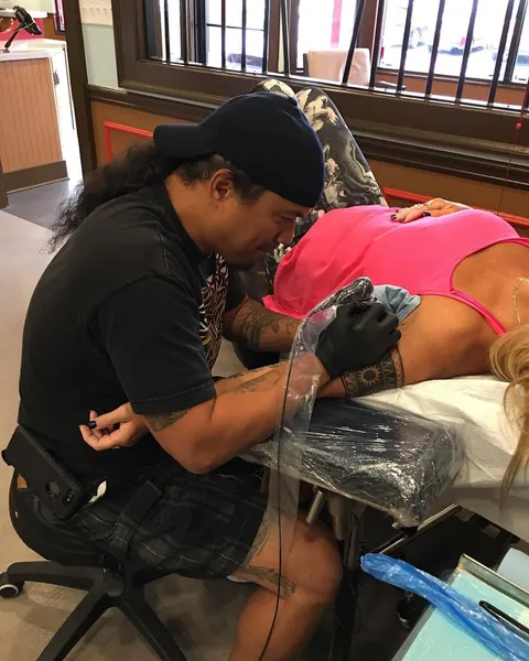 Ink and Dagger Tattoo