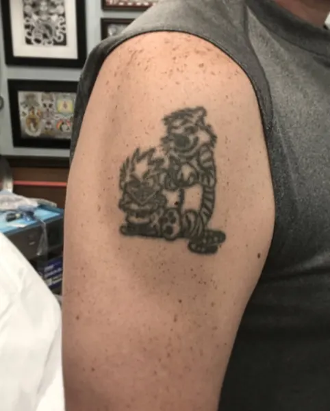 Ink and Dagger Tattoo