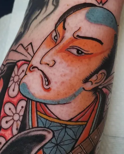 Ink and Dagger Tattoo
