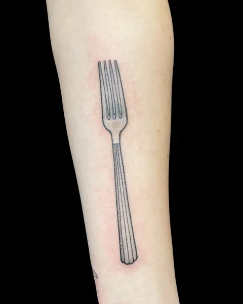 Ink and Dagger Tattoo